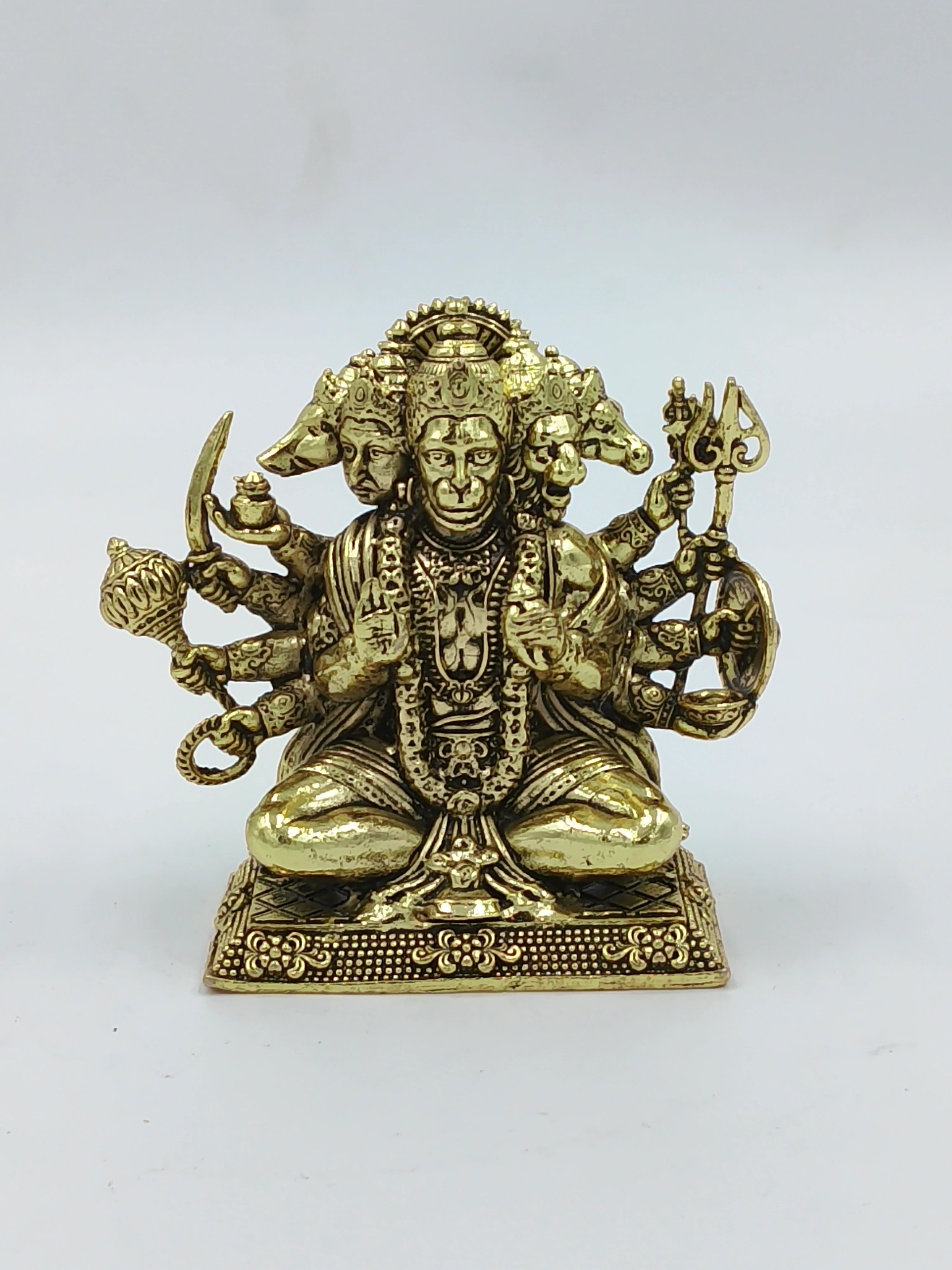 Small brass Panchamukhi Hanuman statue with five faces and multiple arms in seated pose