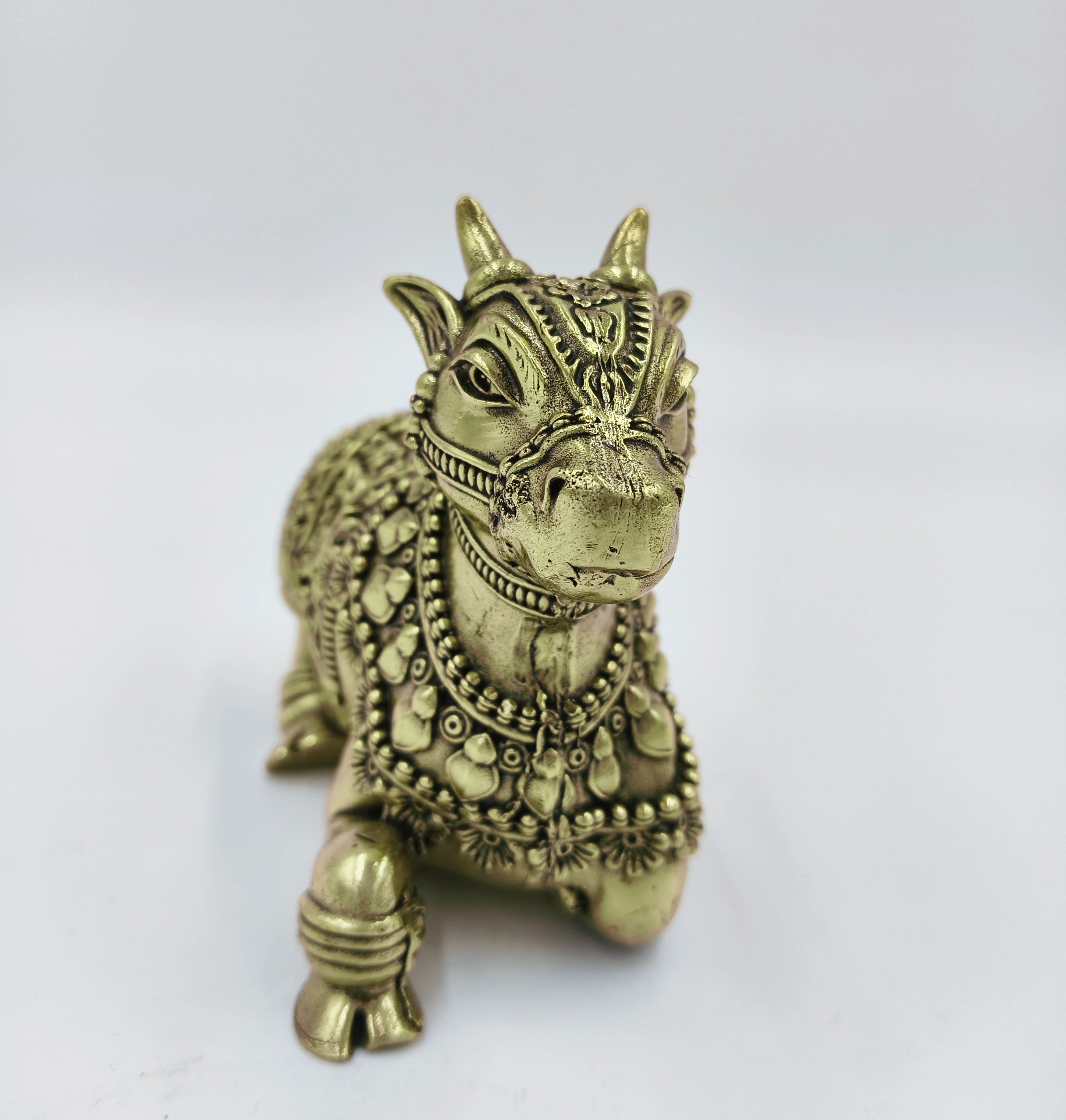Brass Nandhi sculpture with detailed ornaments, front view