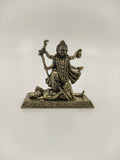 Mini brass statue of Kalika deity with four arms standing on a figure