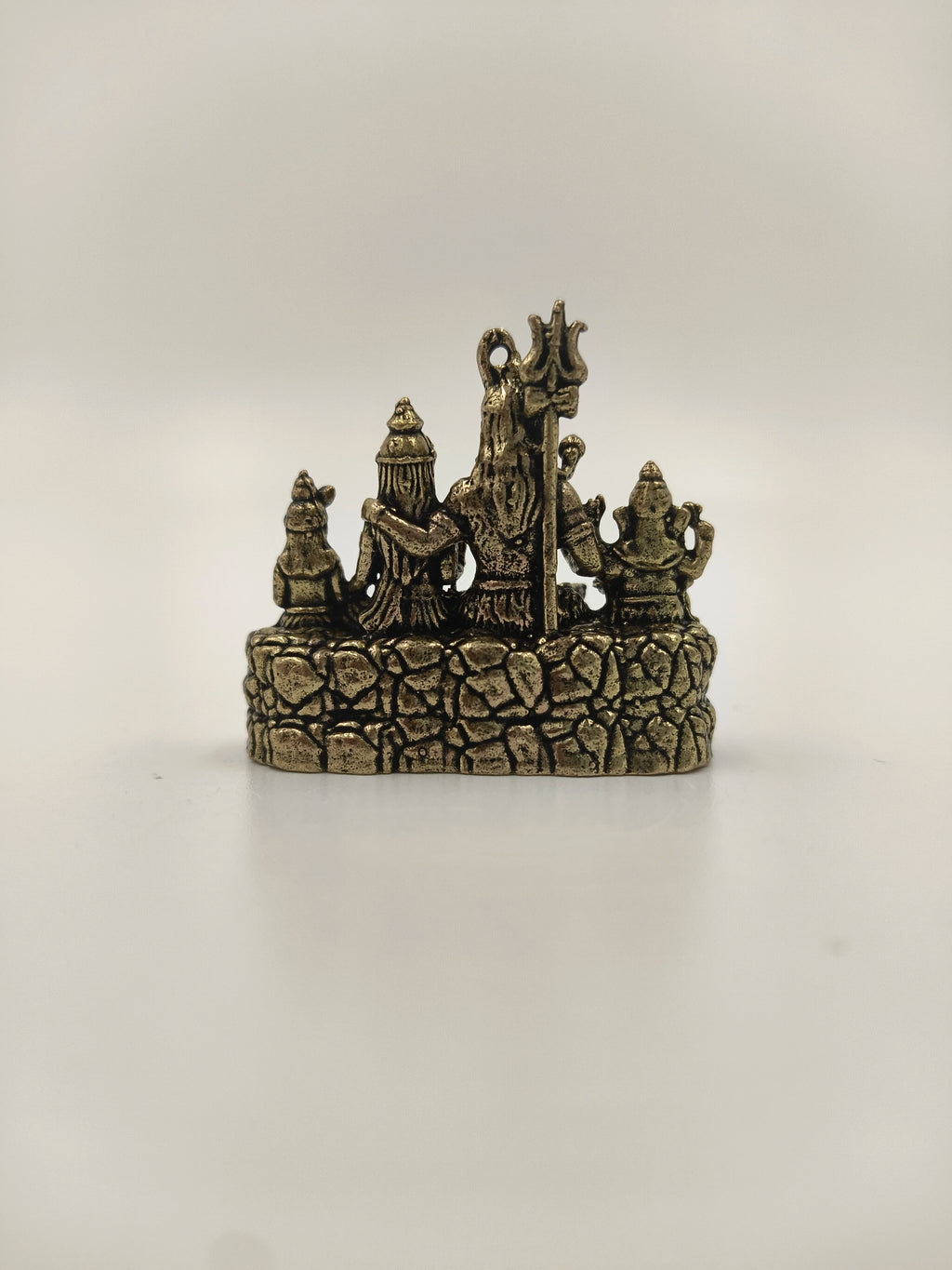 Back view of mini brass Shiv Parivar sculpture with Shiva and family
