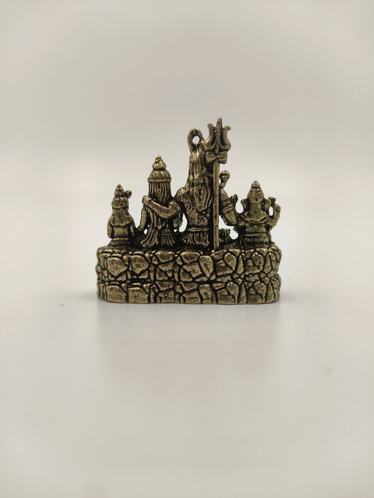 Back view of mini brass Shiv Parivar sculpture with Shiva and family