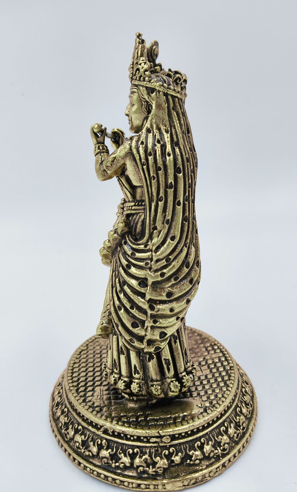 Side view of medium brass Radhakrishna statue with detailed base