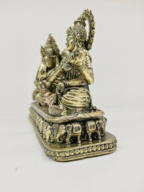 Small brass Trayi Ashirwad statue depicting Lakshmi, Ganesh, and Saraswathi side view