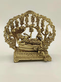 Medium brass Vishnu Lakshmi sculpture with detailed arch and multiple figures