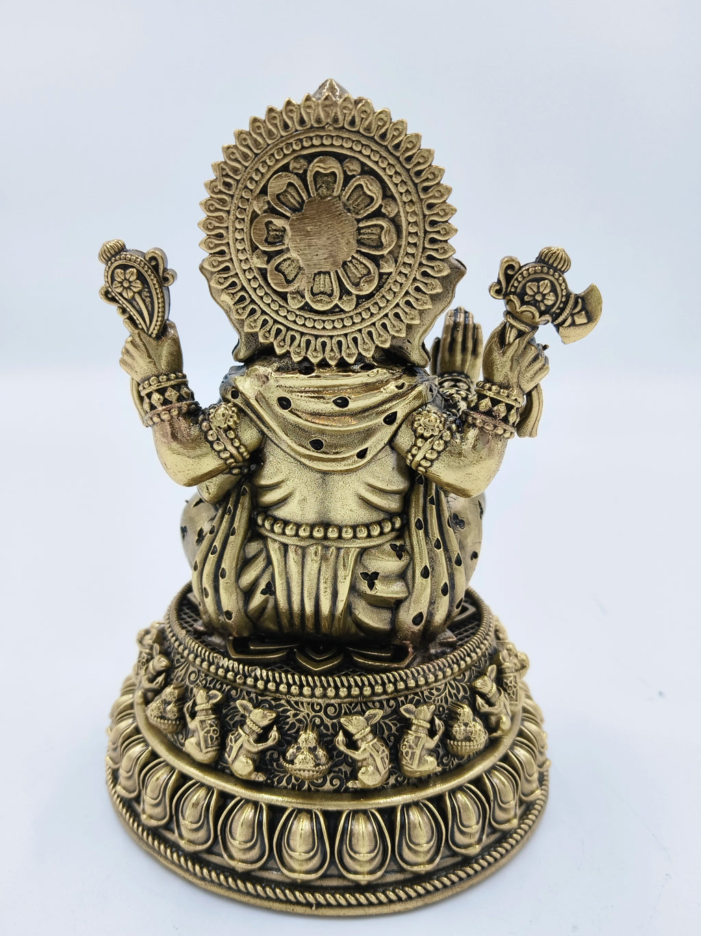 Back view of a medium brass Siddhi Ganapati statue with intricate detailing