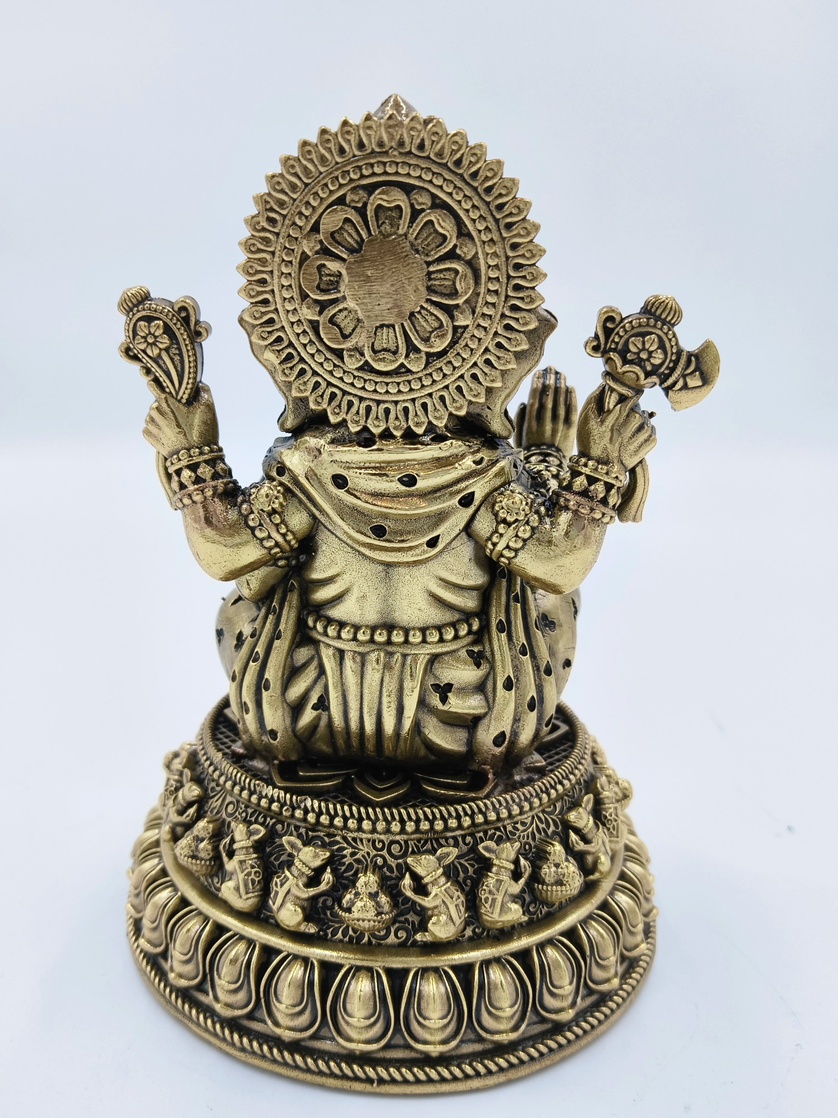 Back view of a medium brass Siddhi Ganapati statue with intricate detailing