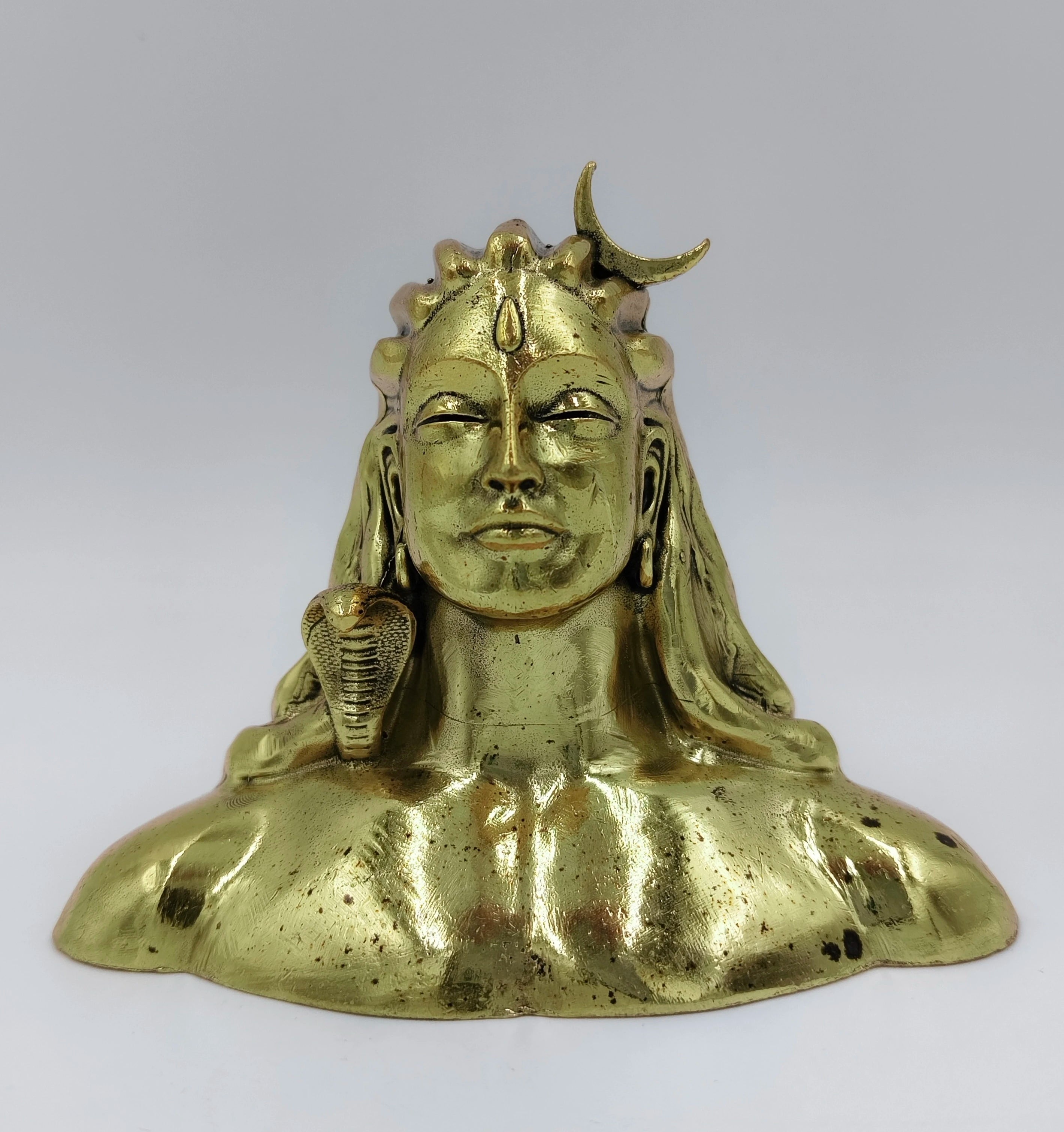 Small brass bust sculpture of Adiyogi Shiva with crescent moon and cobra