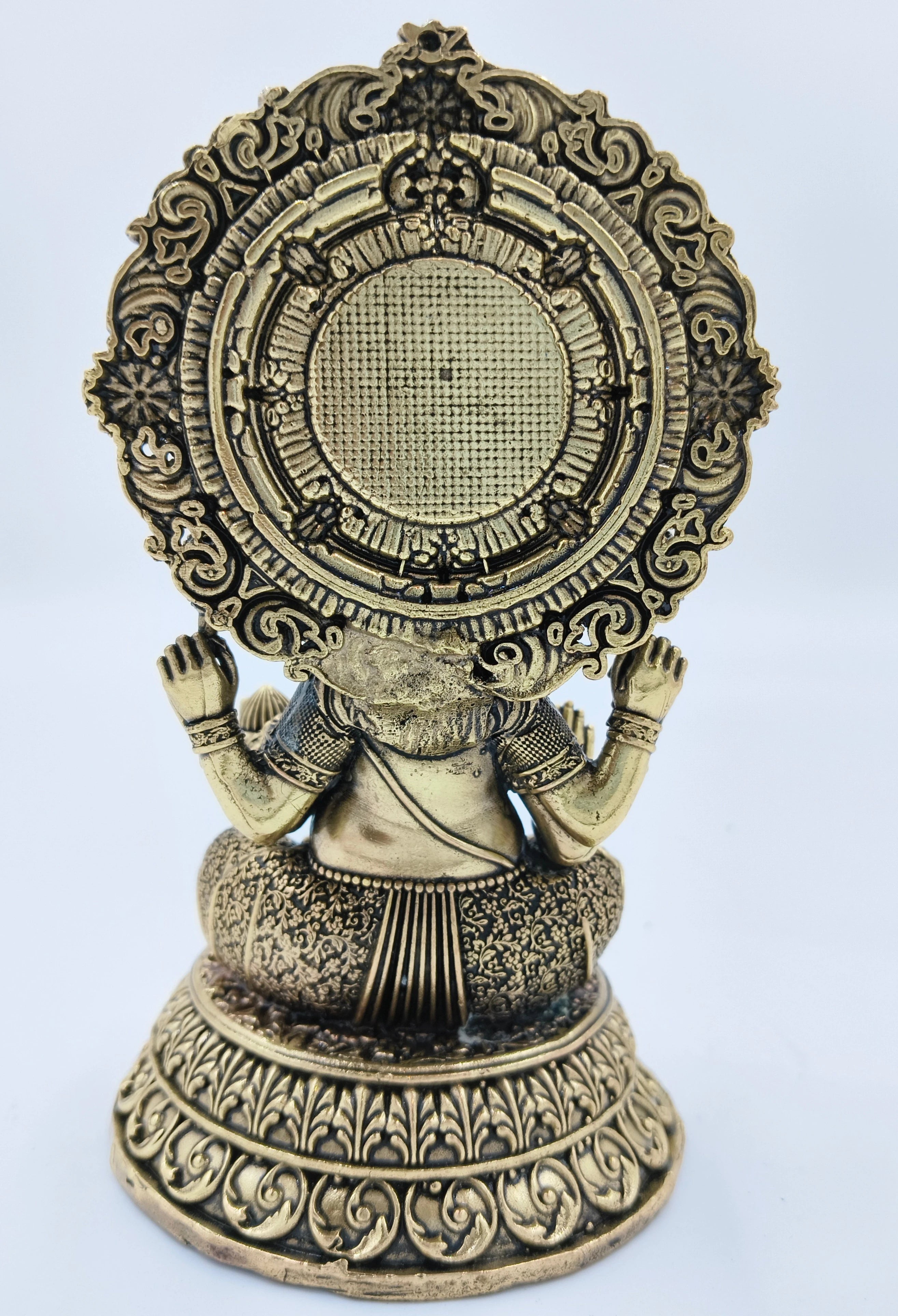 Back view of medium brass Gajanana (Ganesh) sculpture with intricate detailing