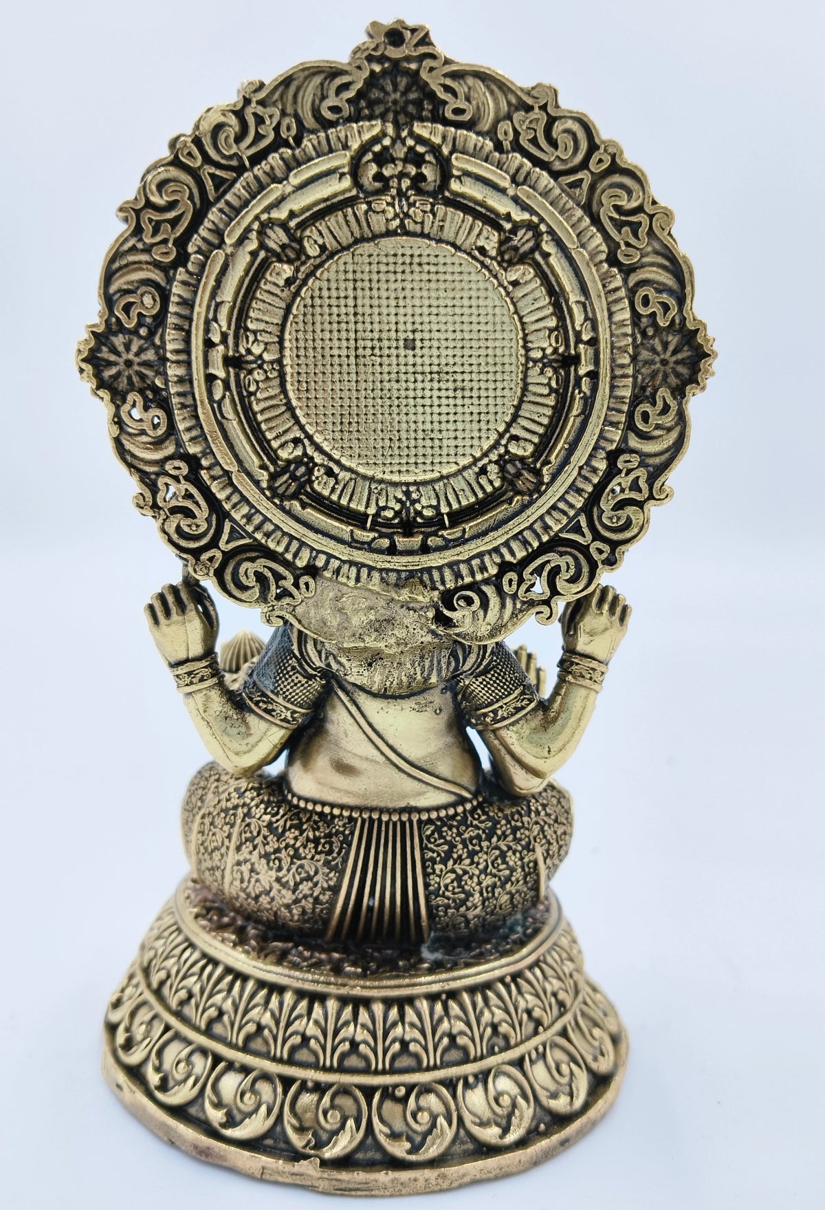 Back view of medium brass Gajanana (Ganesh) sculpture with intricate detailing