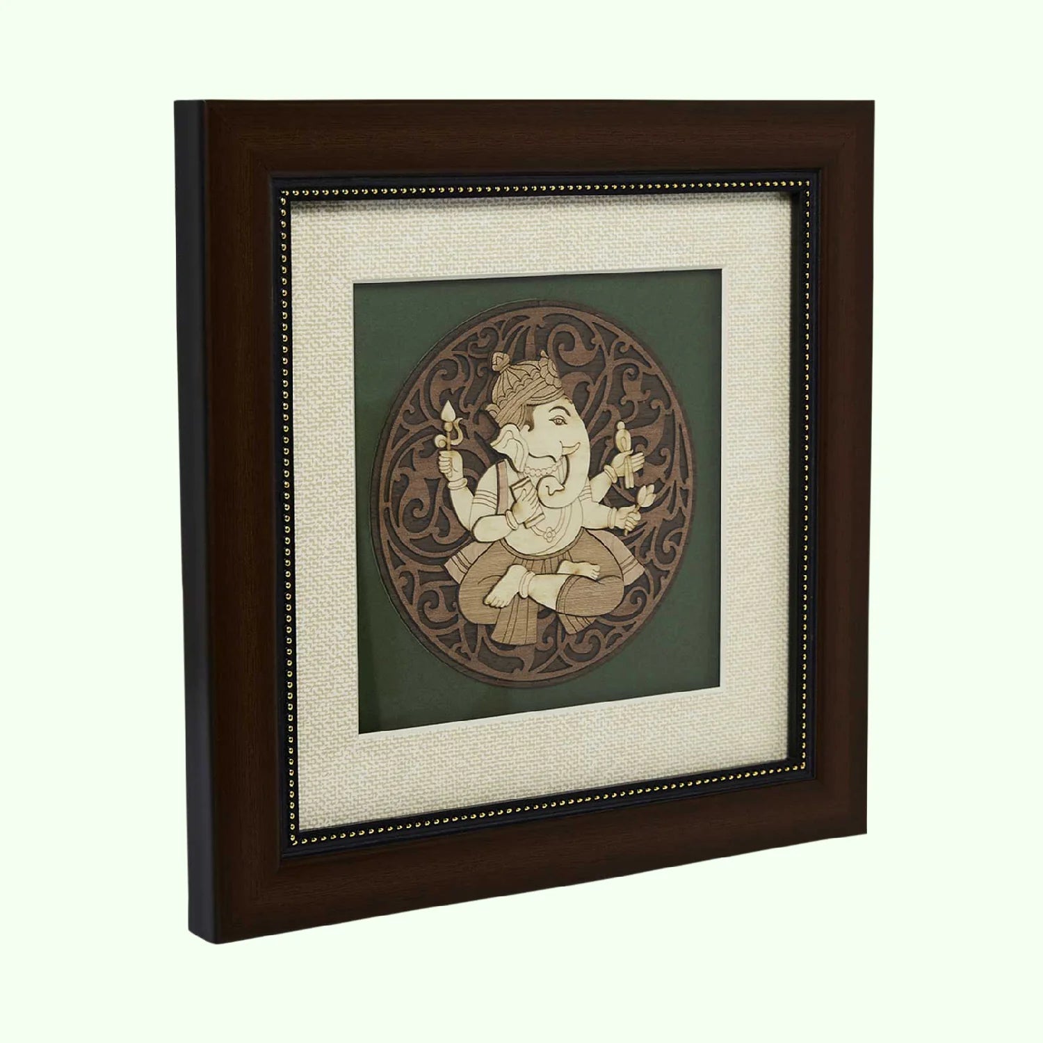 Wooden framed tabletop artwork of Lord Ganesh with intricate carved details
