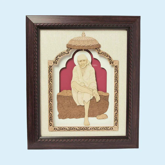 Framed wood art picture of Shirdi Baba sitting under decorative arch