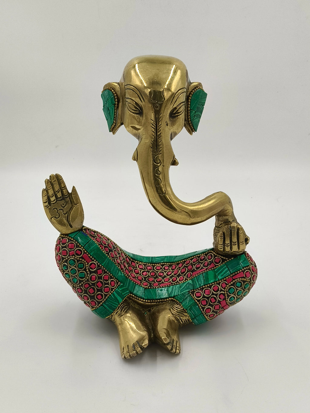 Large brass modern sculpture of seated Ganesh with colorful inlay decoration