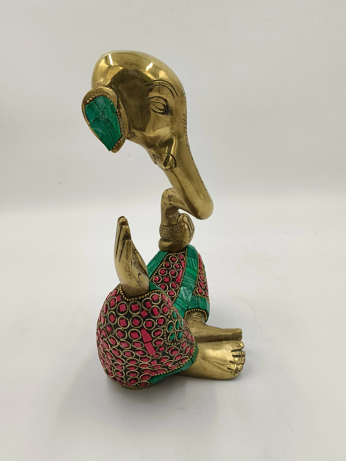 Brass modern Ganesha sculpture with colorful inlaid patterns, side view