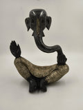 Brass modern Ganesha sculpture in a seated pose with detailed patterns