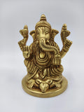 Small brass statue of sitting Lord Ganesha with mouse figure at base