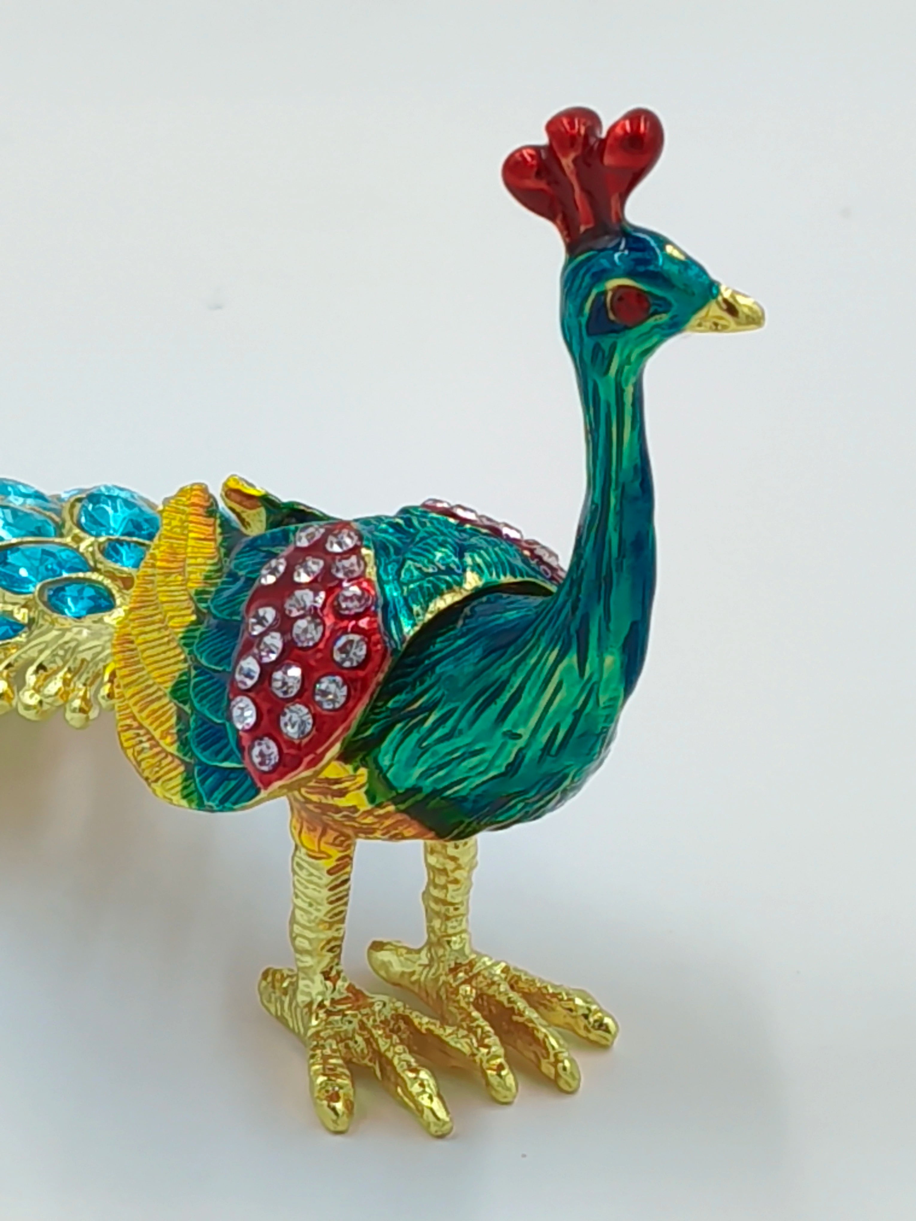 Small brass peacock figurine with copper enamel and decorative stones