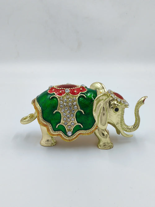 Small brass elephant figurine with green and red copper enamel and rhinestone accents