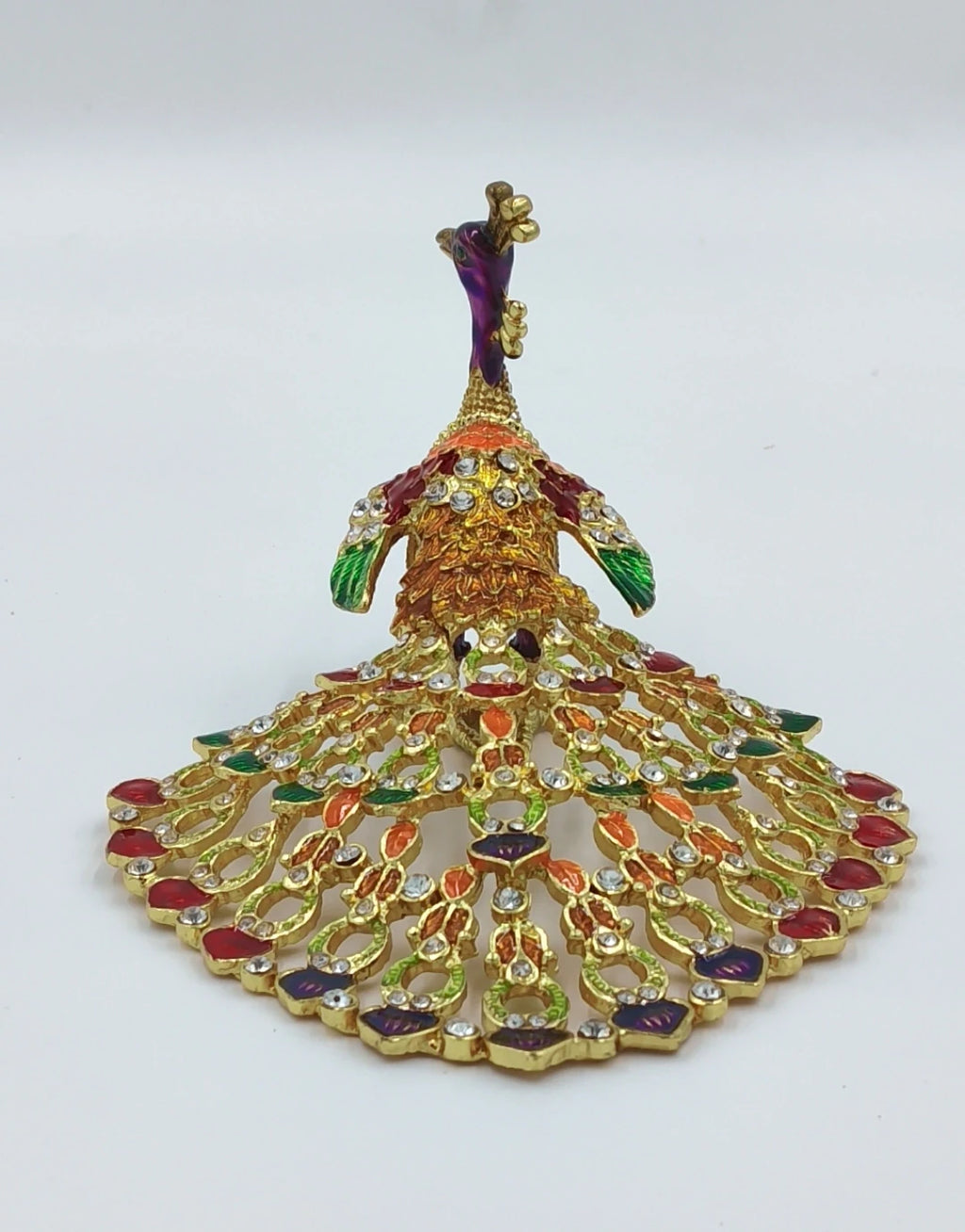 small brass peacock figurine with colorful copper enamel and decorative stones