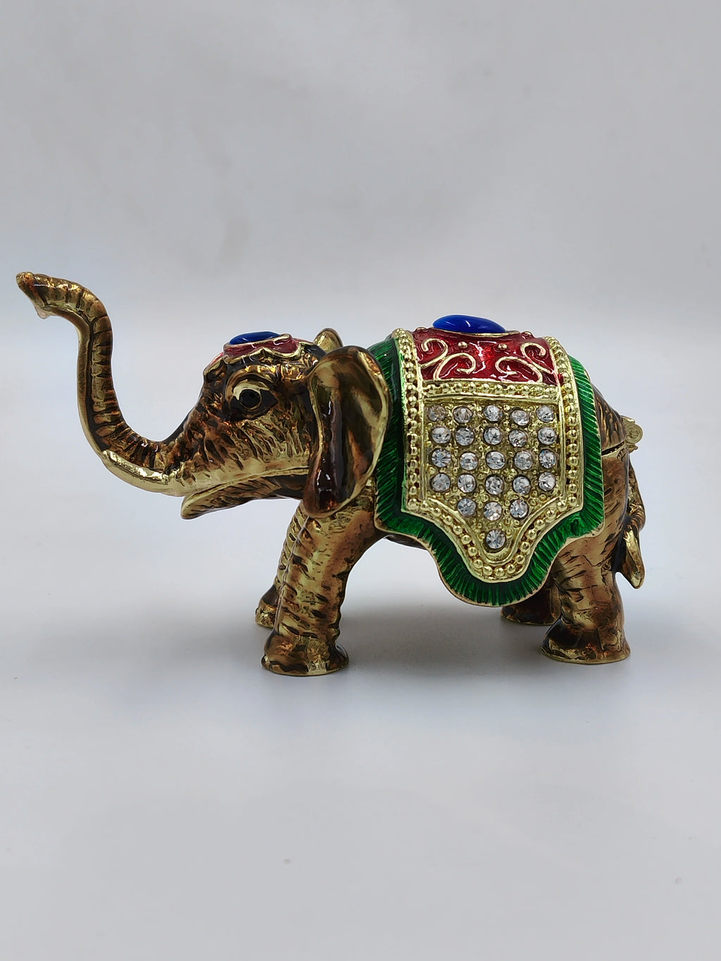 Mini brass elephant figurine with copper enamel and decorative gemstones