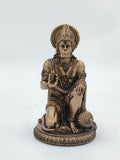 Small polyresin Hanuman statue kneeling with decorated attire and mace