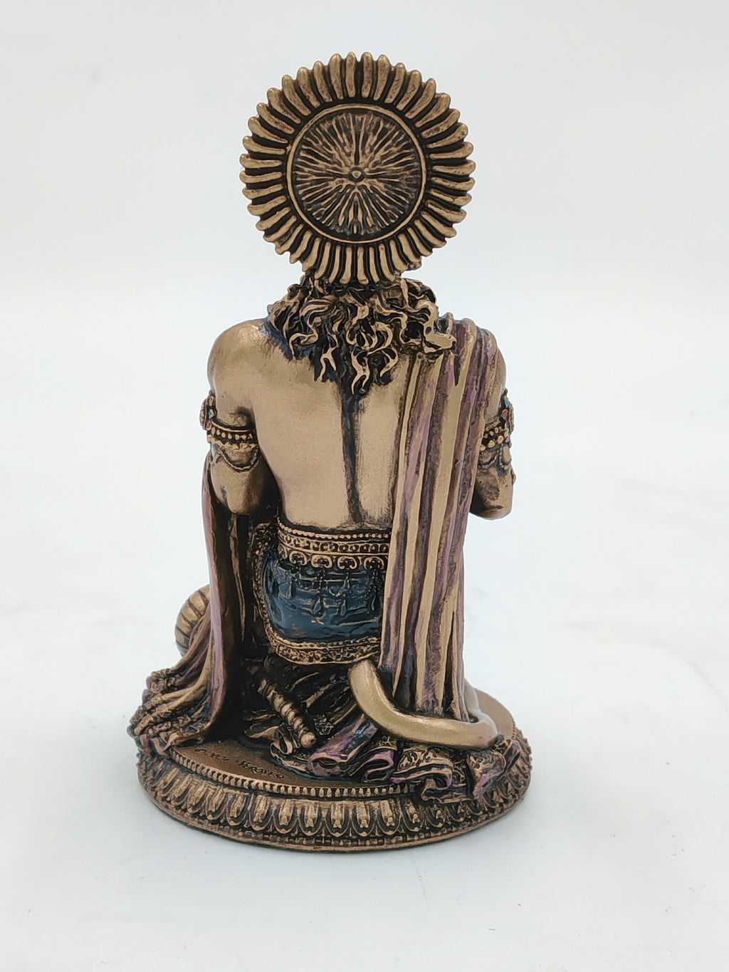 Back view of small polyresin Hanuman statue with detailed ornamental base and ornaments