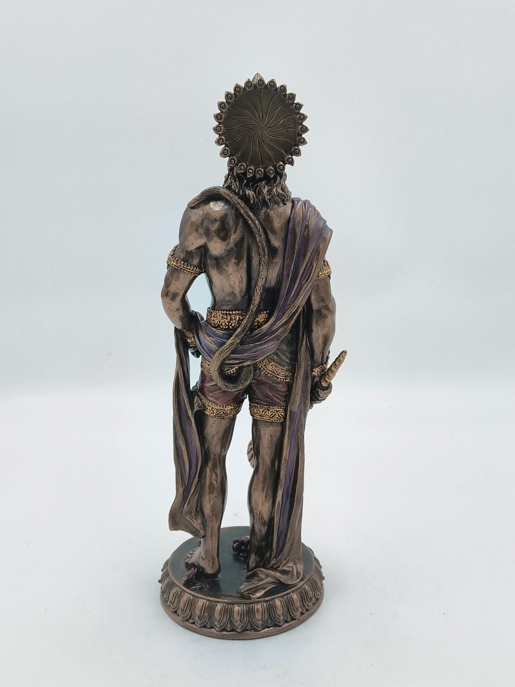 Back view of a large polyresin Hanuman standing statue with detailed clothing and accessories