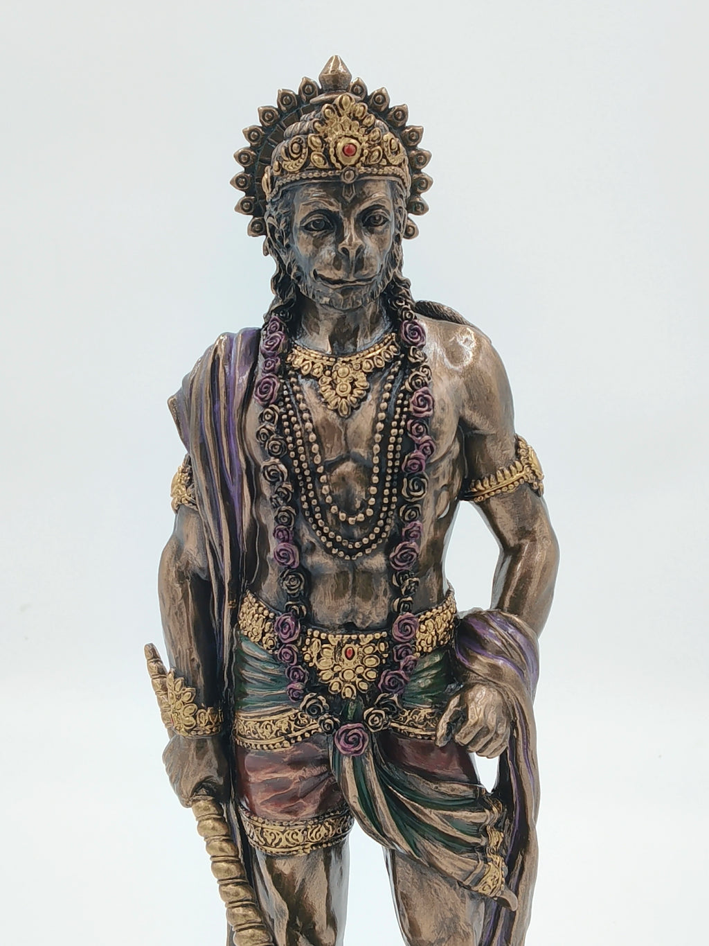 Large polyresin standing Hanuman statue adorned with gold and purple decorations