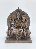 Polyresin sculpture of Shiva family seated on an ornate sinhasan with intricate detailing