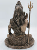 Back view of large polyresin sitting Shiva statue holding trident