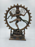 Large polyresin Natraj statue dancing within a decorative circular frame