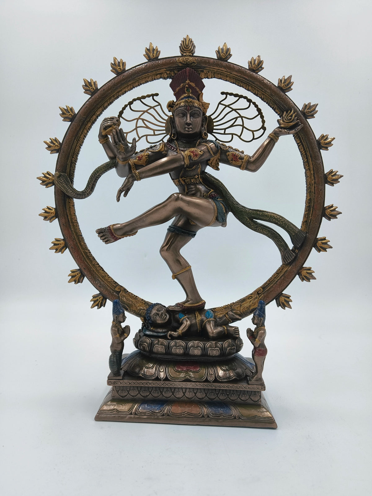 Large polyresin Natraj statue dancing within a decorative circular frame