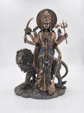 Large polyresin statue of Goddess Durga with multiple arms holding weapons and a lion