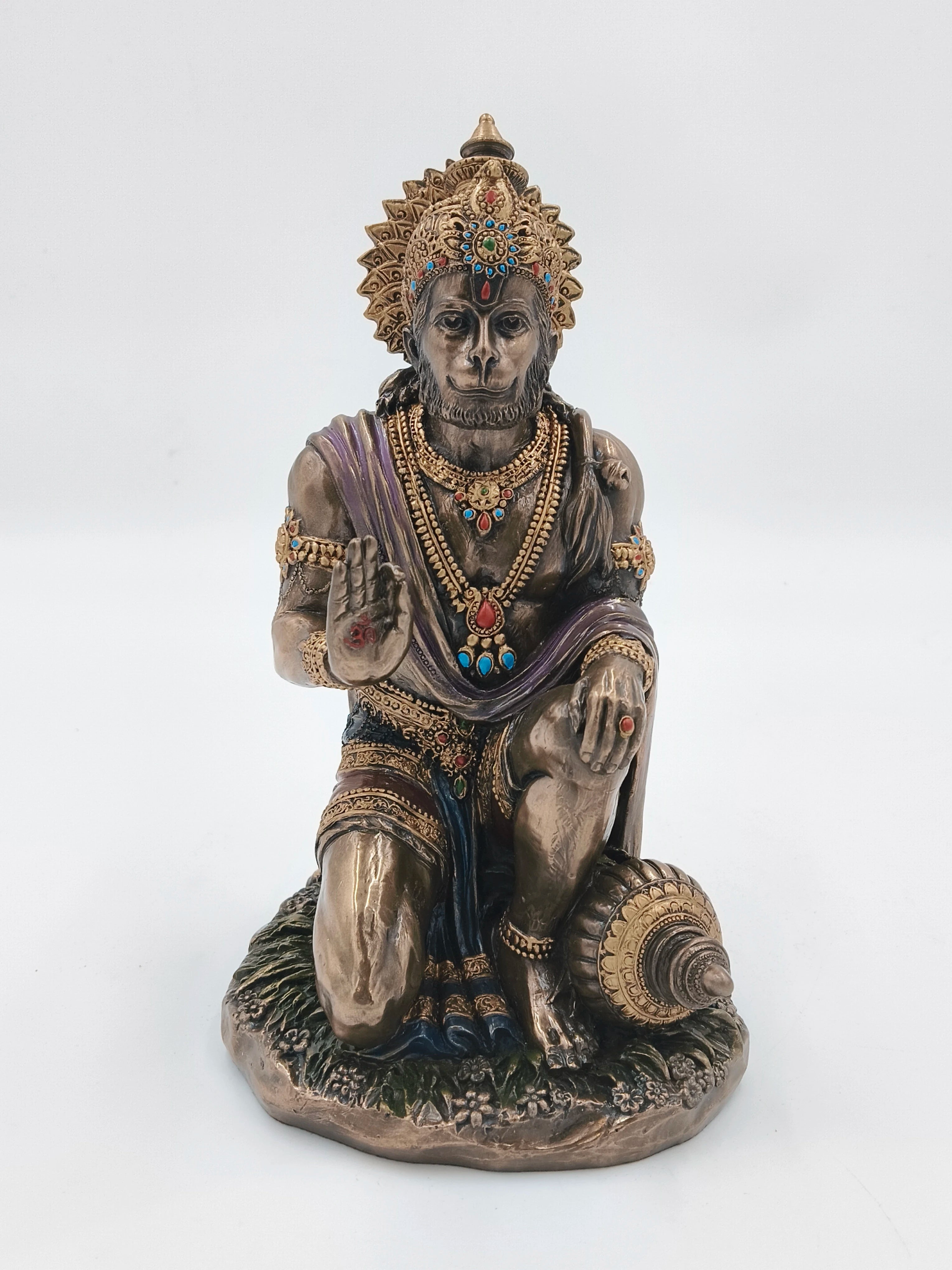 Large polyresin statue of Hanuman kneeling with detailed ornamentation and mace