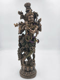 large polyresin Krishna statue playing flute with detailed ornaments and base