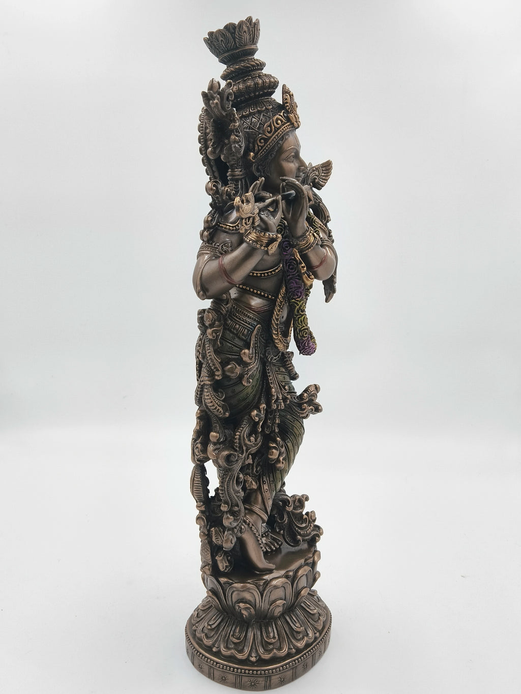 Large polyresin sculpture of Krishna playing flute with intricate detailing