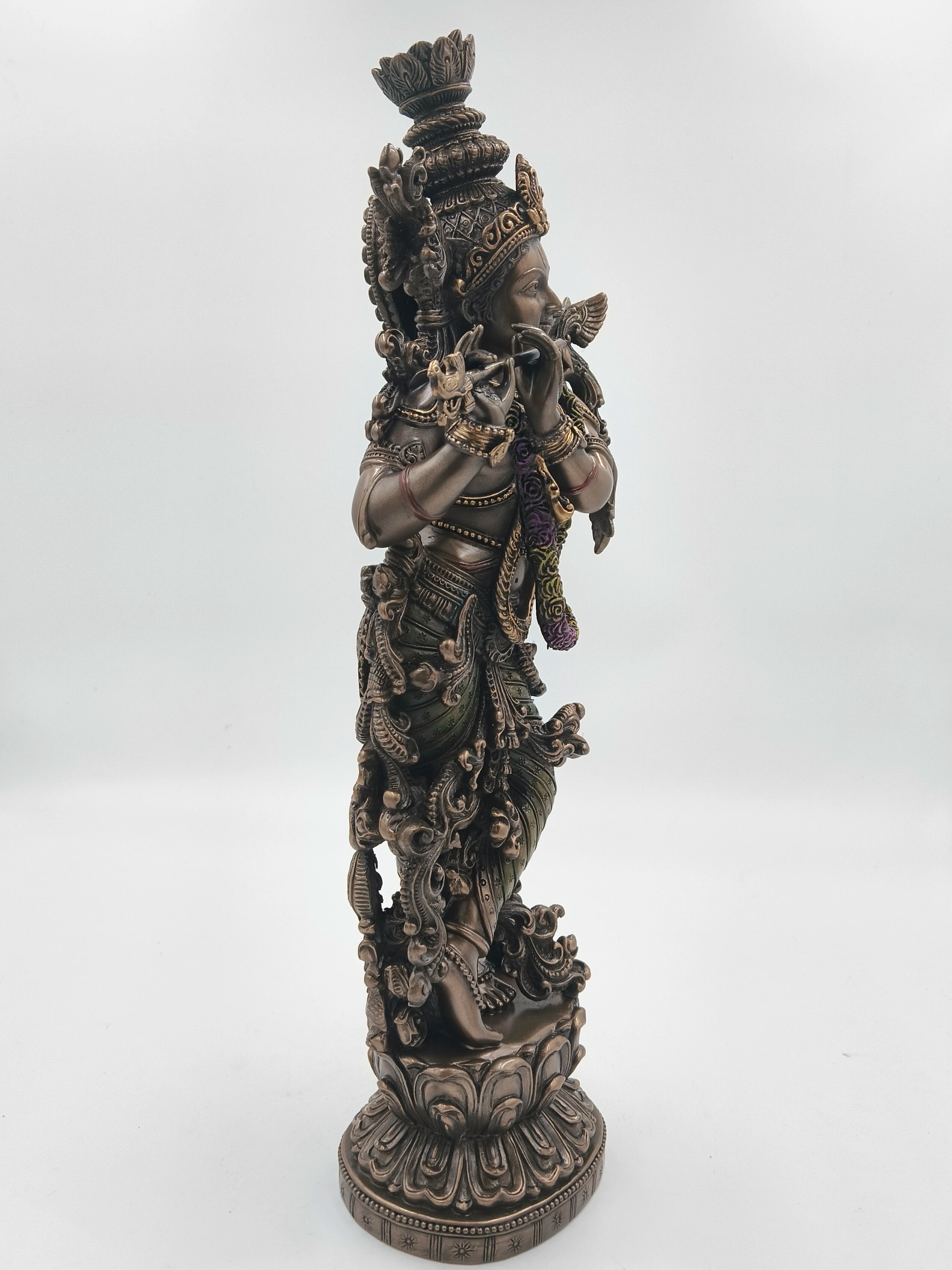 Large polyresin sculpture of Krishna playing flute with intricate detailing