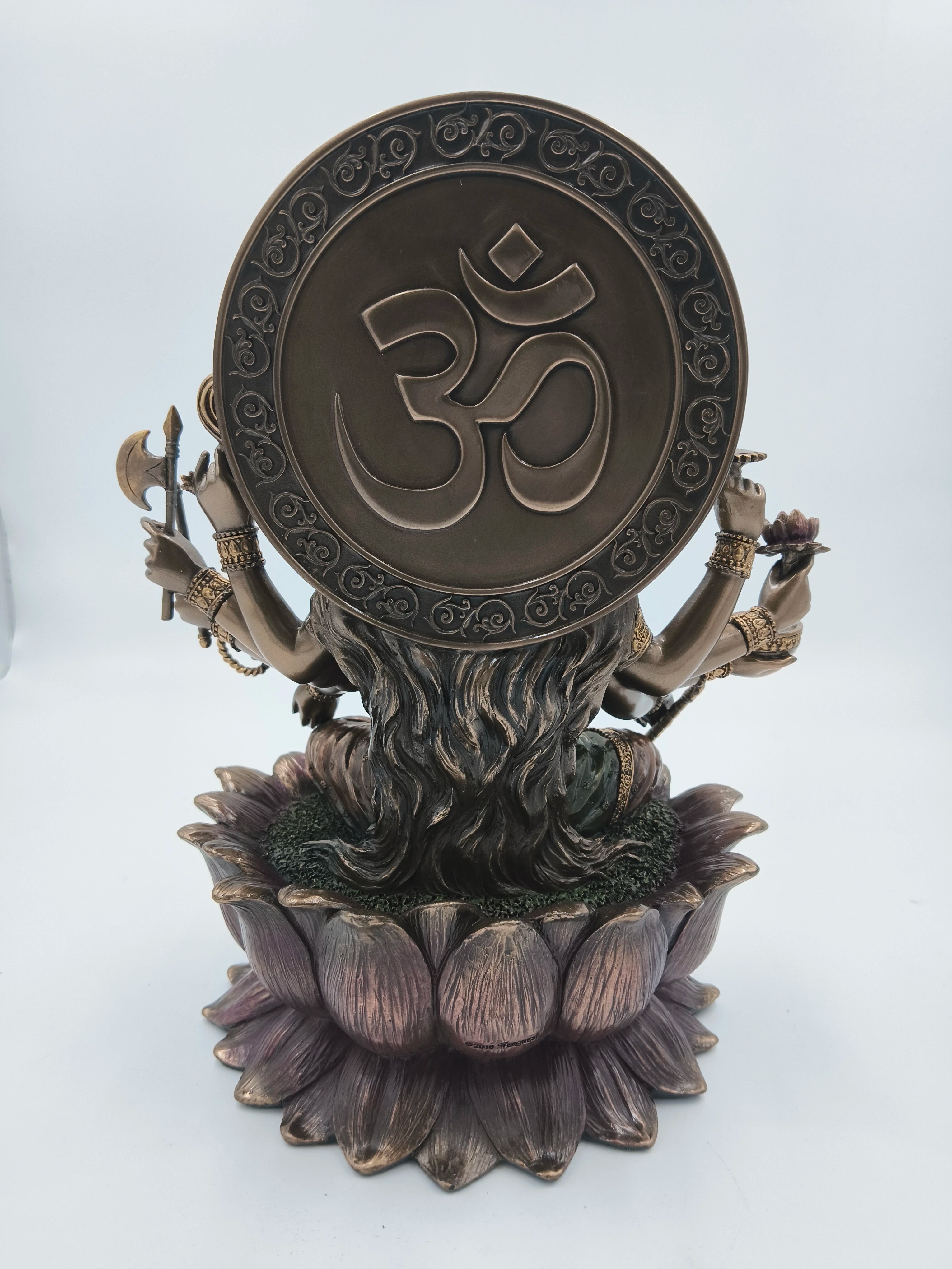 Back view of large polyresin Gayatri Ma sculpture seated on lotus base