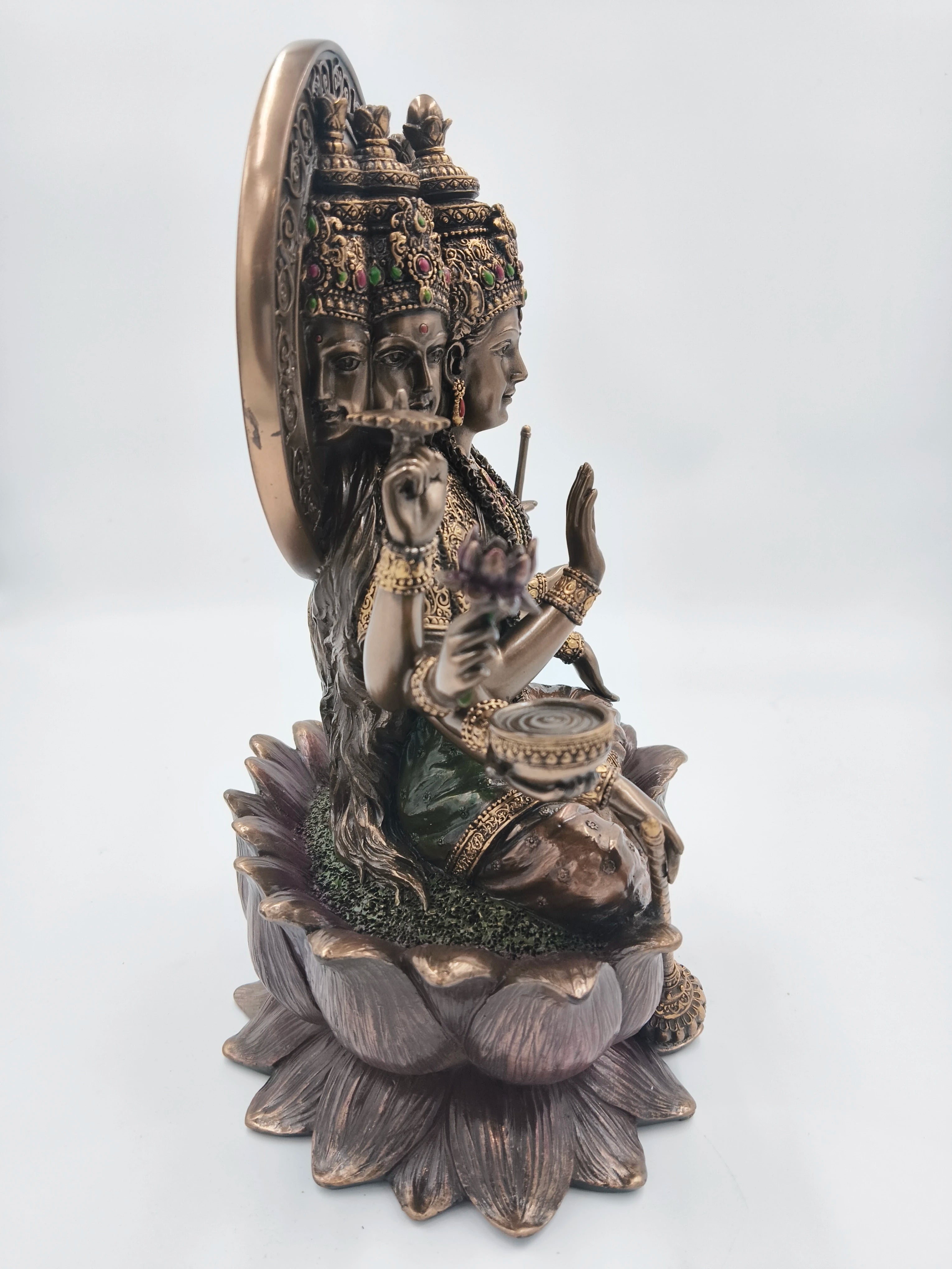 Polyresin statue of Gayatri Ma with three faces seated on a lotus flower