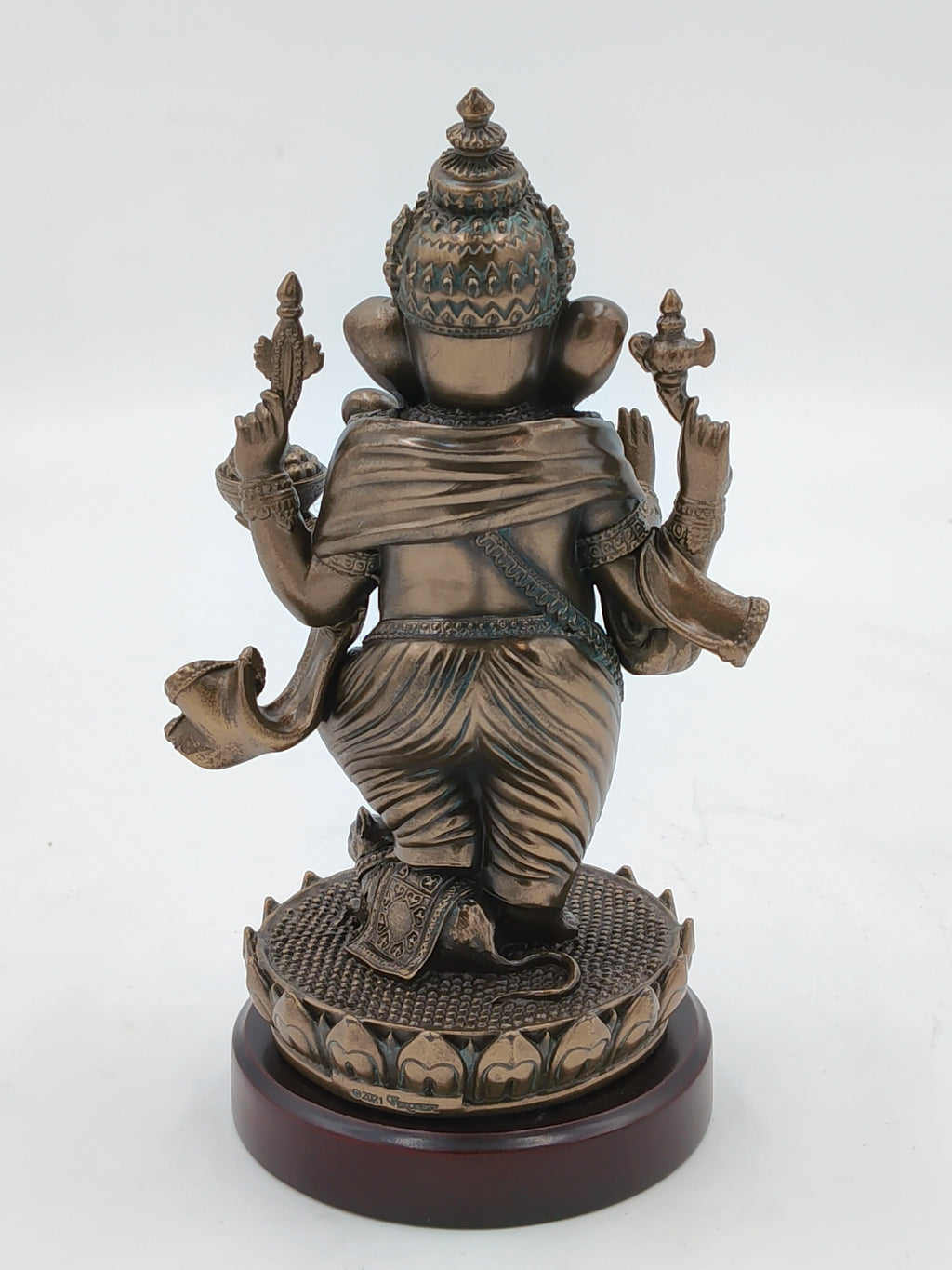 Back view of medium polyresin standing Ganesh statue on round base