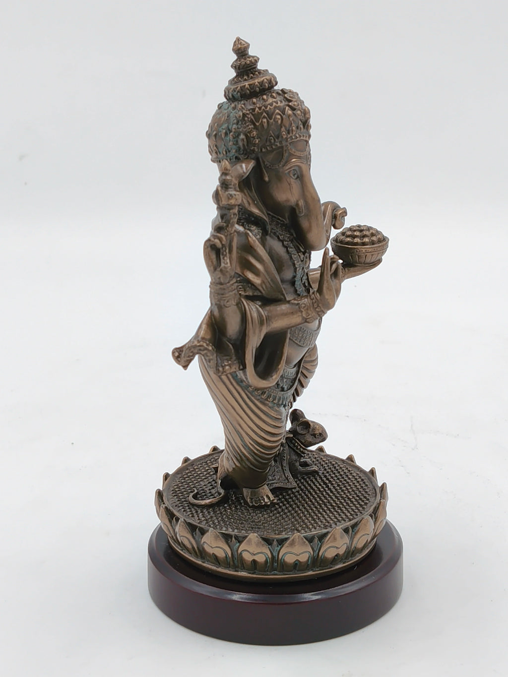 Medium polyresin standing Ganesh statue on decorative base side view