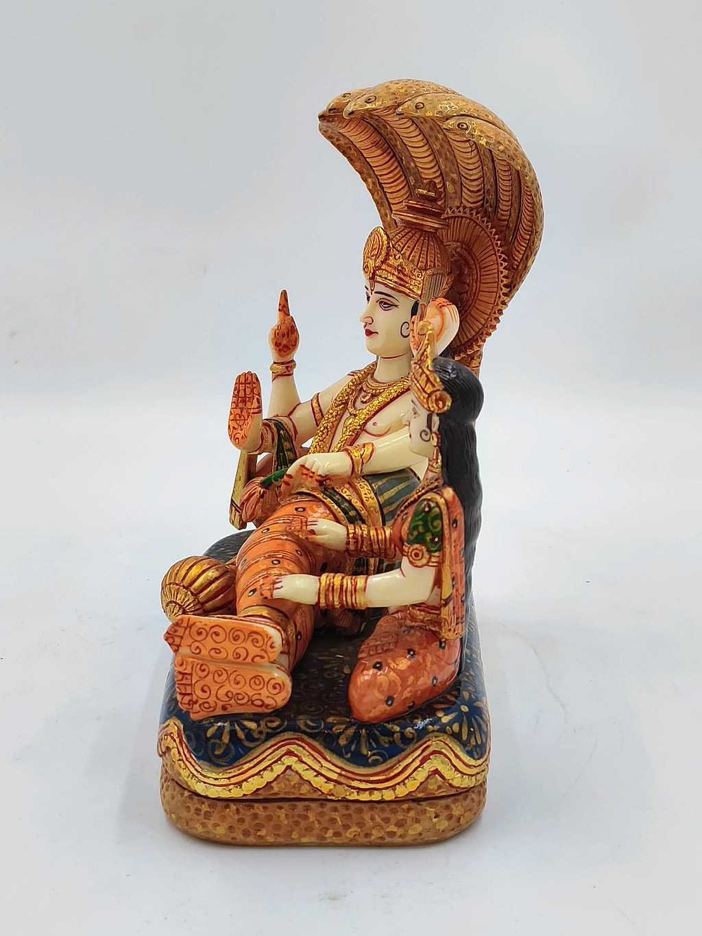 Large polyresin sculpture of Vishnu and Lakshmi seated with decorative attire