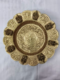 Mini brass decor plate with intricate floral patterns and Hindu deity figures
