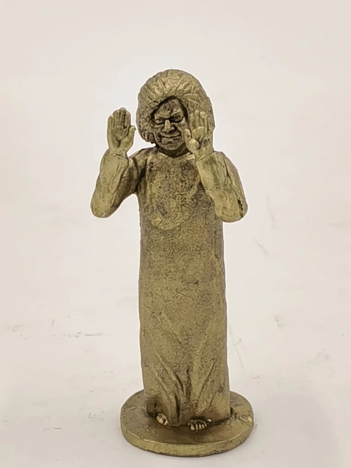 Small brass Sai Baba figurine with raised hands on round base