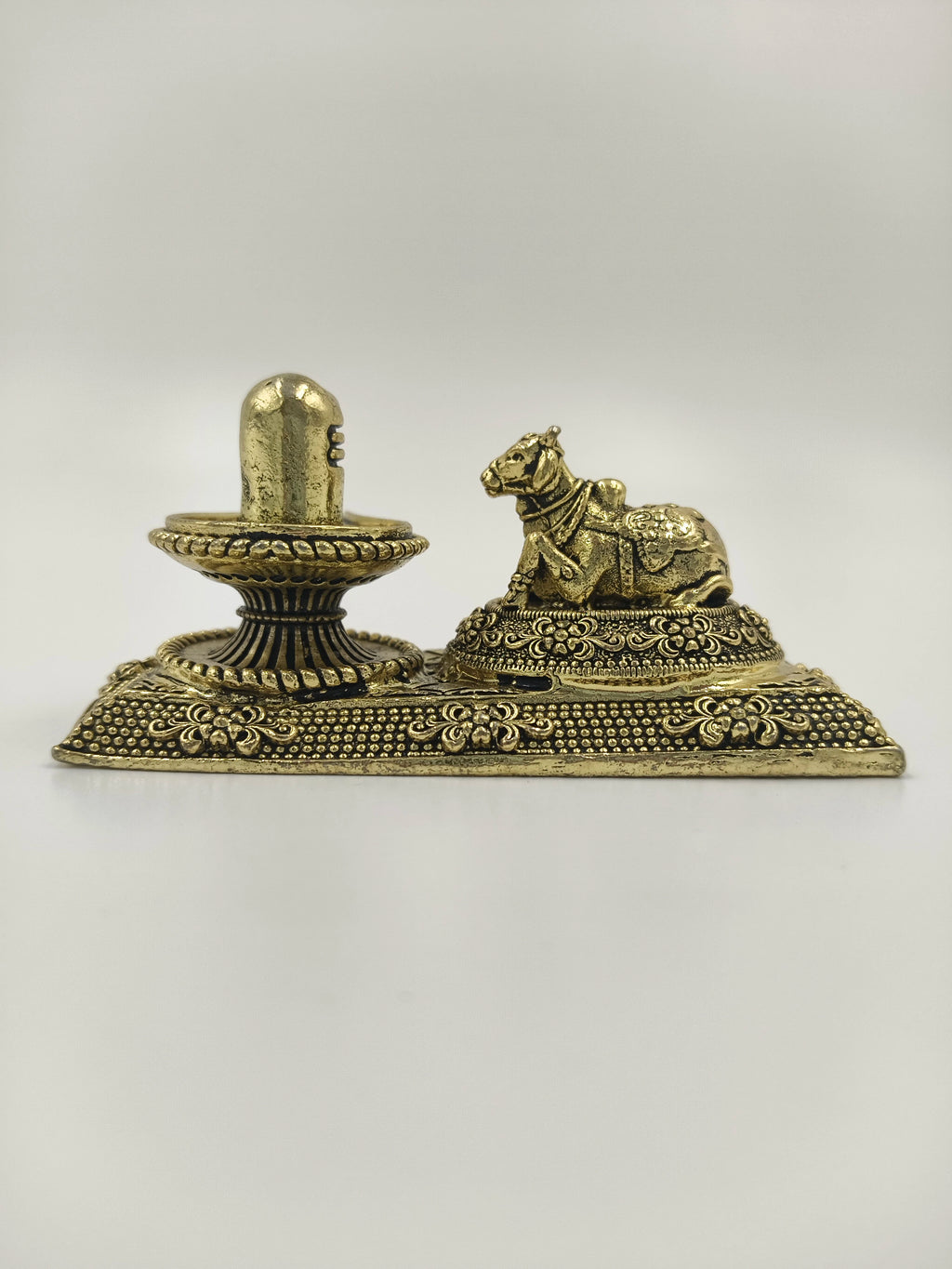 Mini brass Shivalinga sculpture with Nandhi on decorative base side view