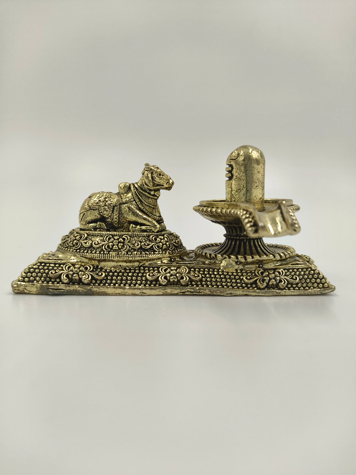 Mini brass shivalinga sculpture with detailed Nandhi on rectangular base