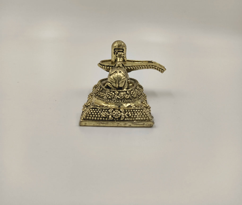 Front view of a mini brass Shivalinga sculpture with Nandhi on decorated base