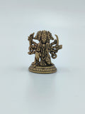 Mini brass Panchamukhi Hanuman sculpture with multiple arms holding weapons