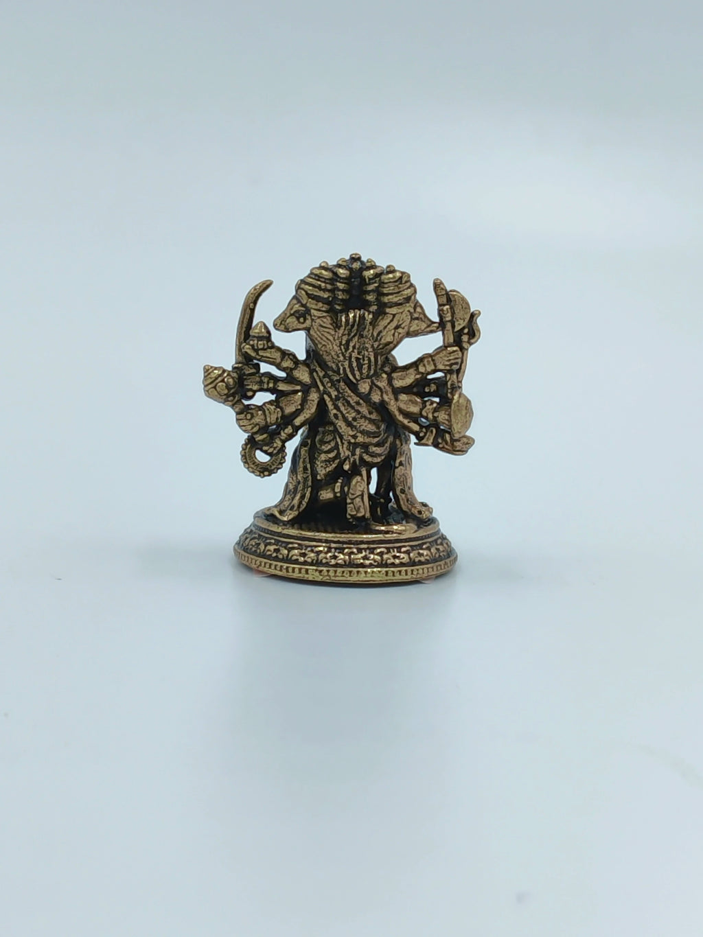 Compact brass mini Panchamukhi Hanuman sculpture with five faces and multiple arms
