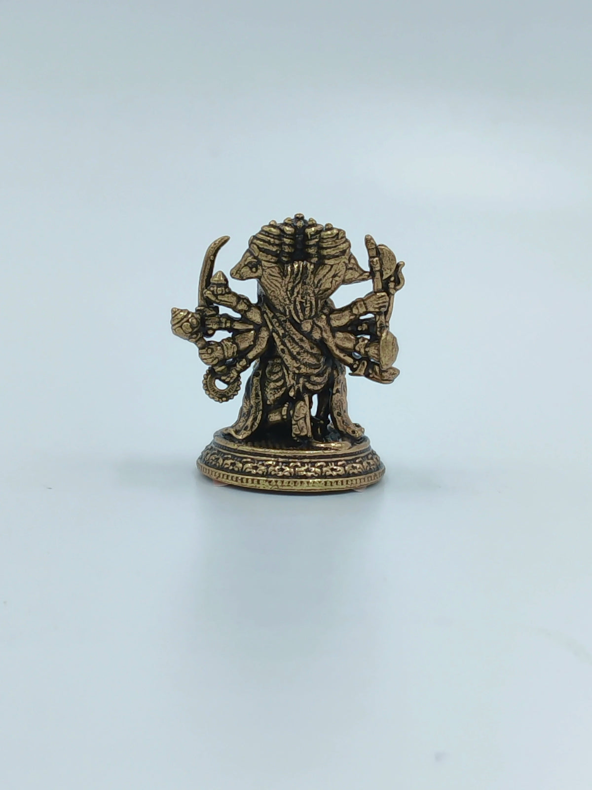 Compact brass mini Panchamukhi Hanuman sculpture with five faces and multiple arms