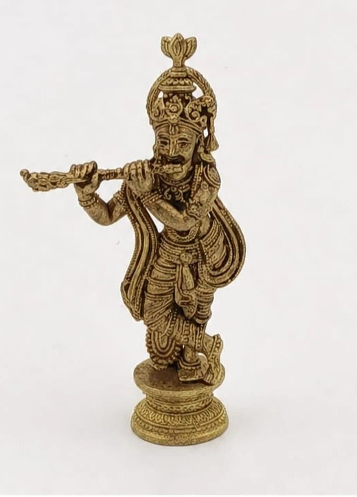 Mini brass statue of Krishna playing flute with detailed ornamentation